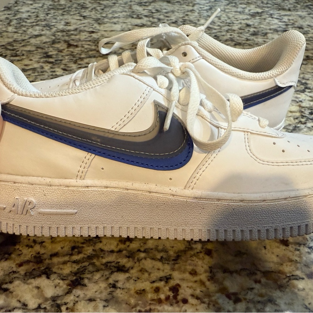 Nike Kids White and Gray Sneakers with Blue Swoosh